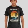 A person is wearing a black t-shirt with a Hawaii beach-themed print and an orange bucket hat against a neutral background.
