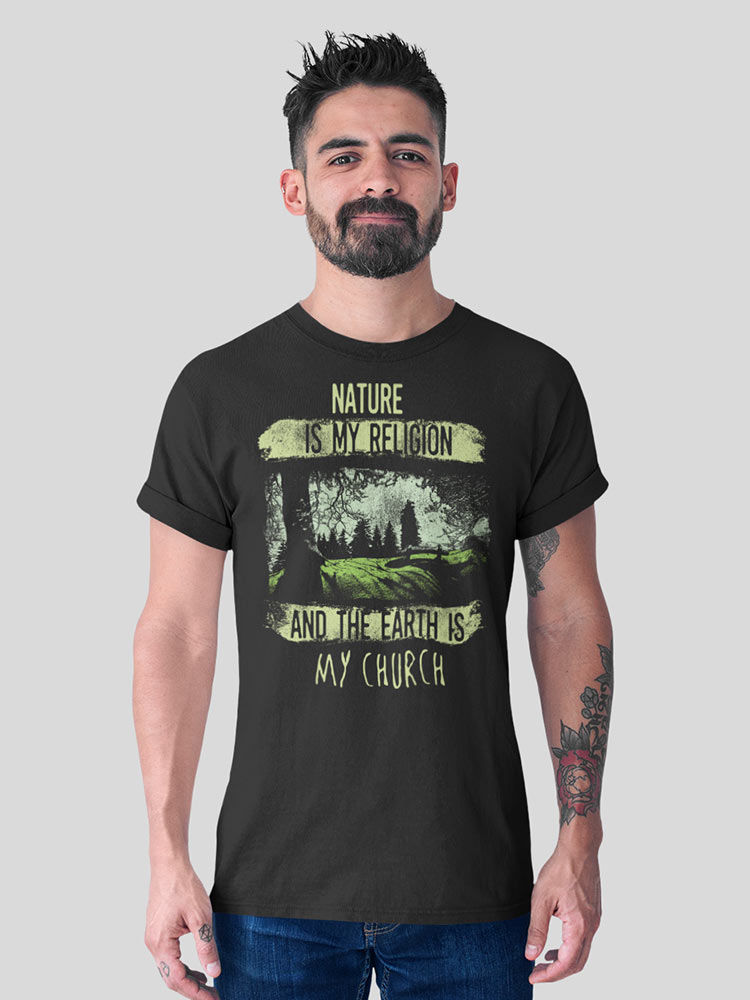 A person with a beard is wearing a black t-shirt with a nature-themed print stating "Nature is my religion and the Earth is my church."